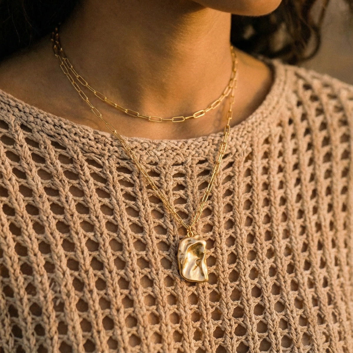 Molten Dreams gold-tone layered necklace on a female modell