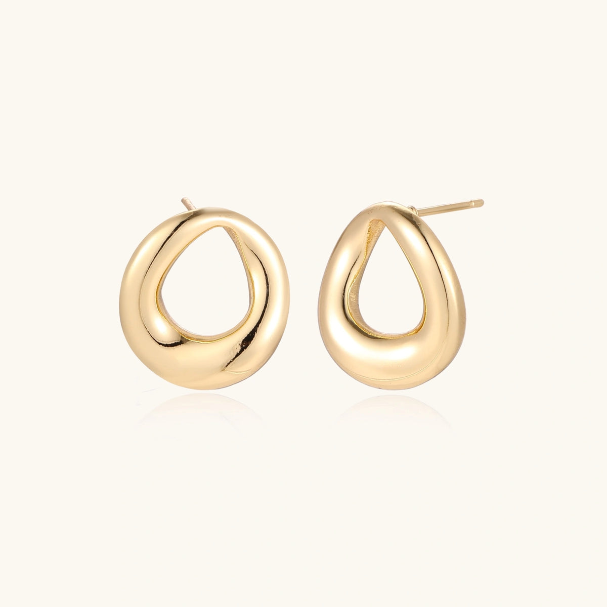 Elara Loop Studs gold-tone earrings on a white background
