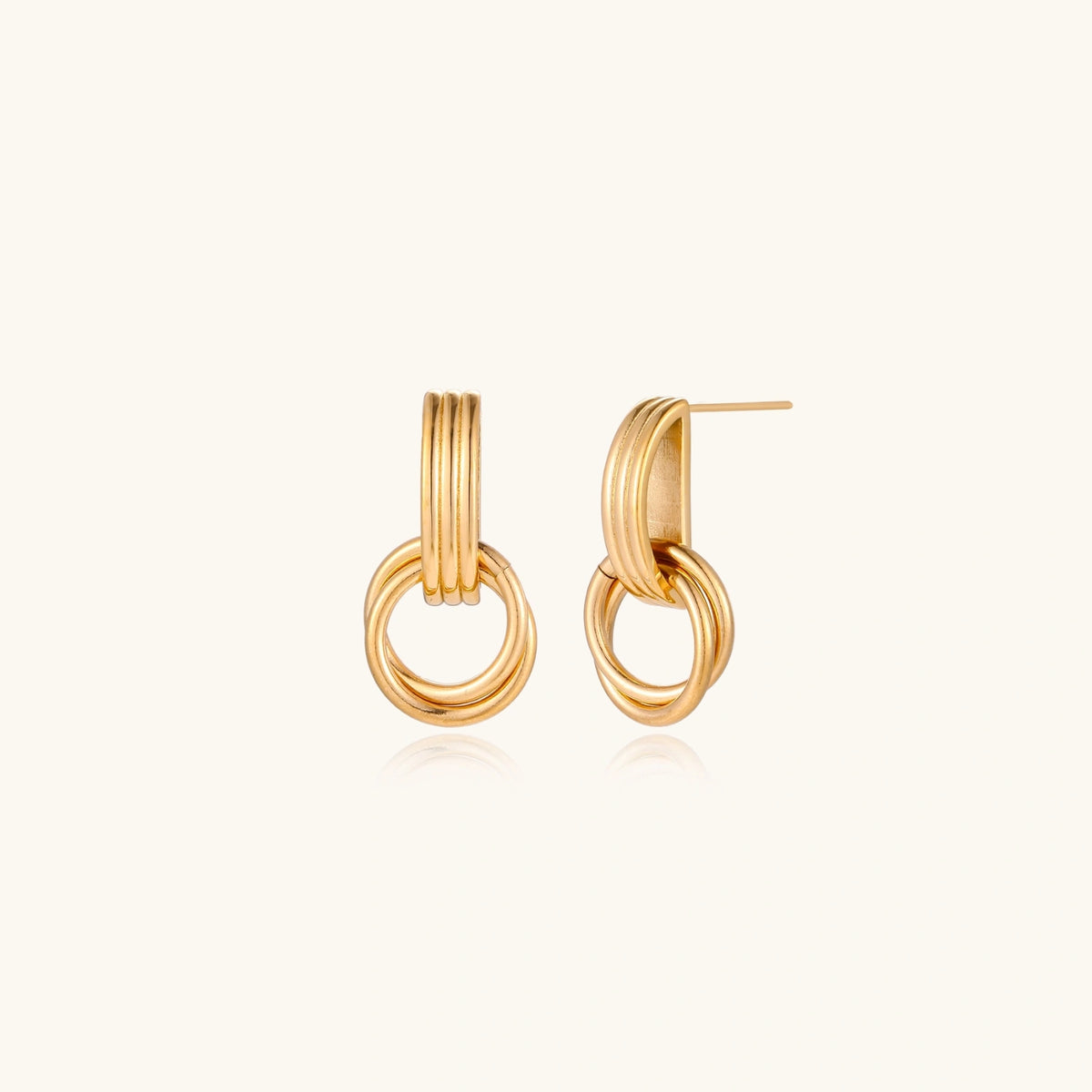 Linea Drop Earrings gold-tone earrings on a white background