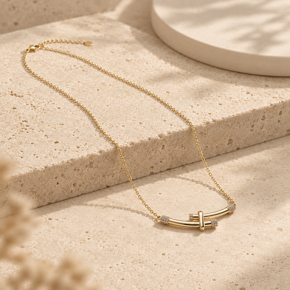 Bamboo Crystal Arc Necklace Gold-plated curved bar necklace with diamond accents on delicate chain against cream background