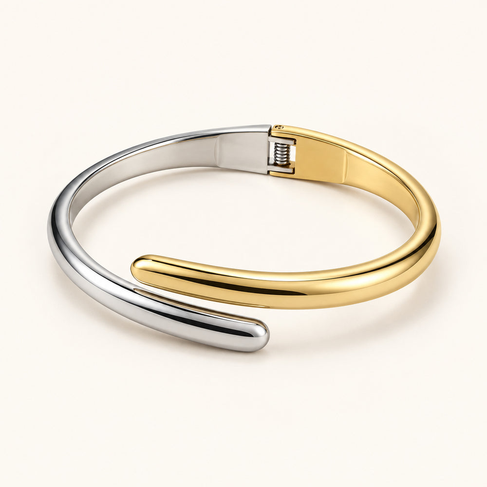 Elara Dual Tone Cuff silver and gold-tone bracelet on a white background