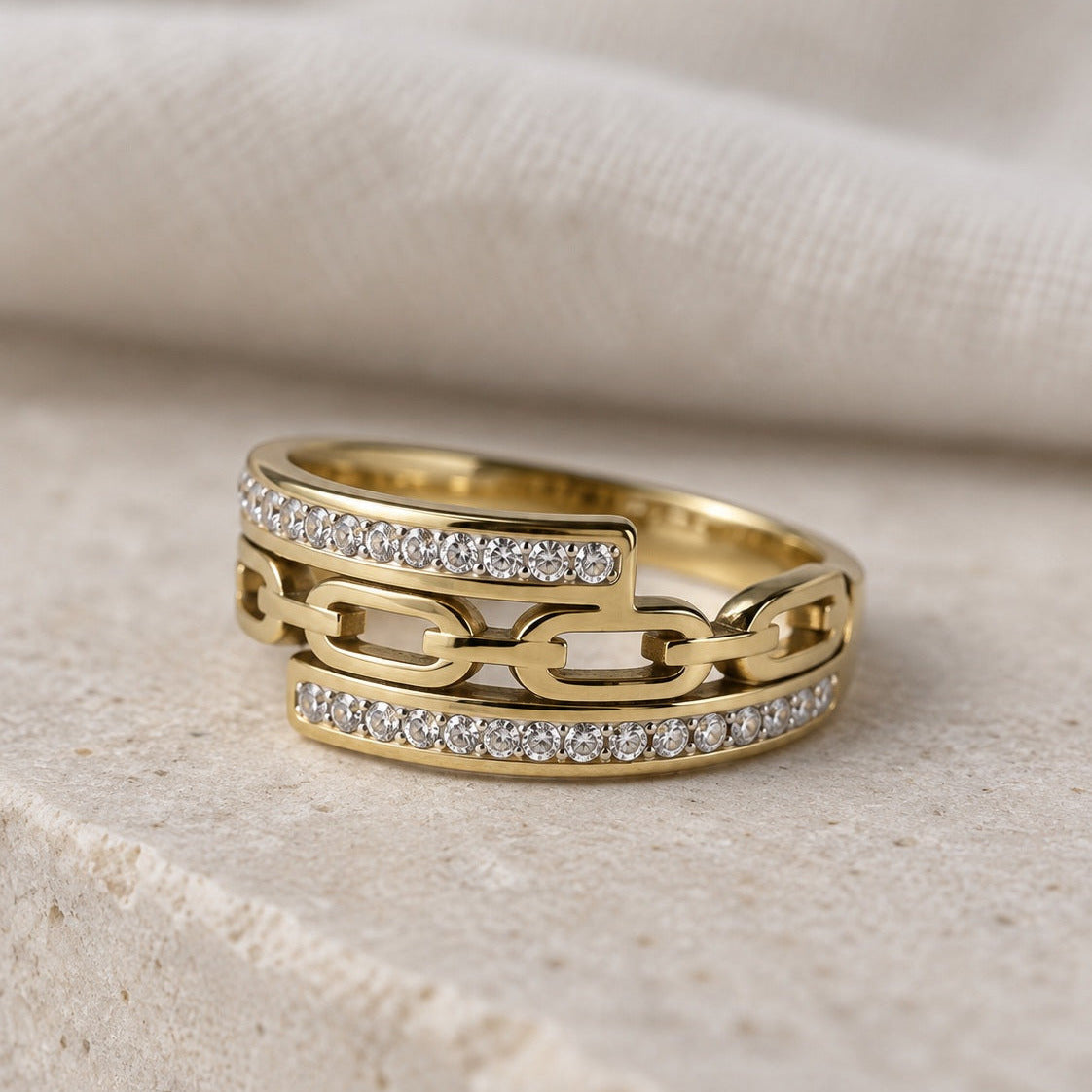 Lia Chain Ring gold-tone chain style ring in a cream studio setting