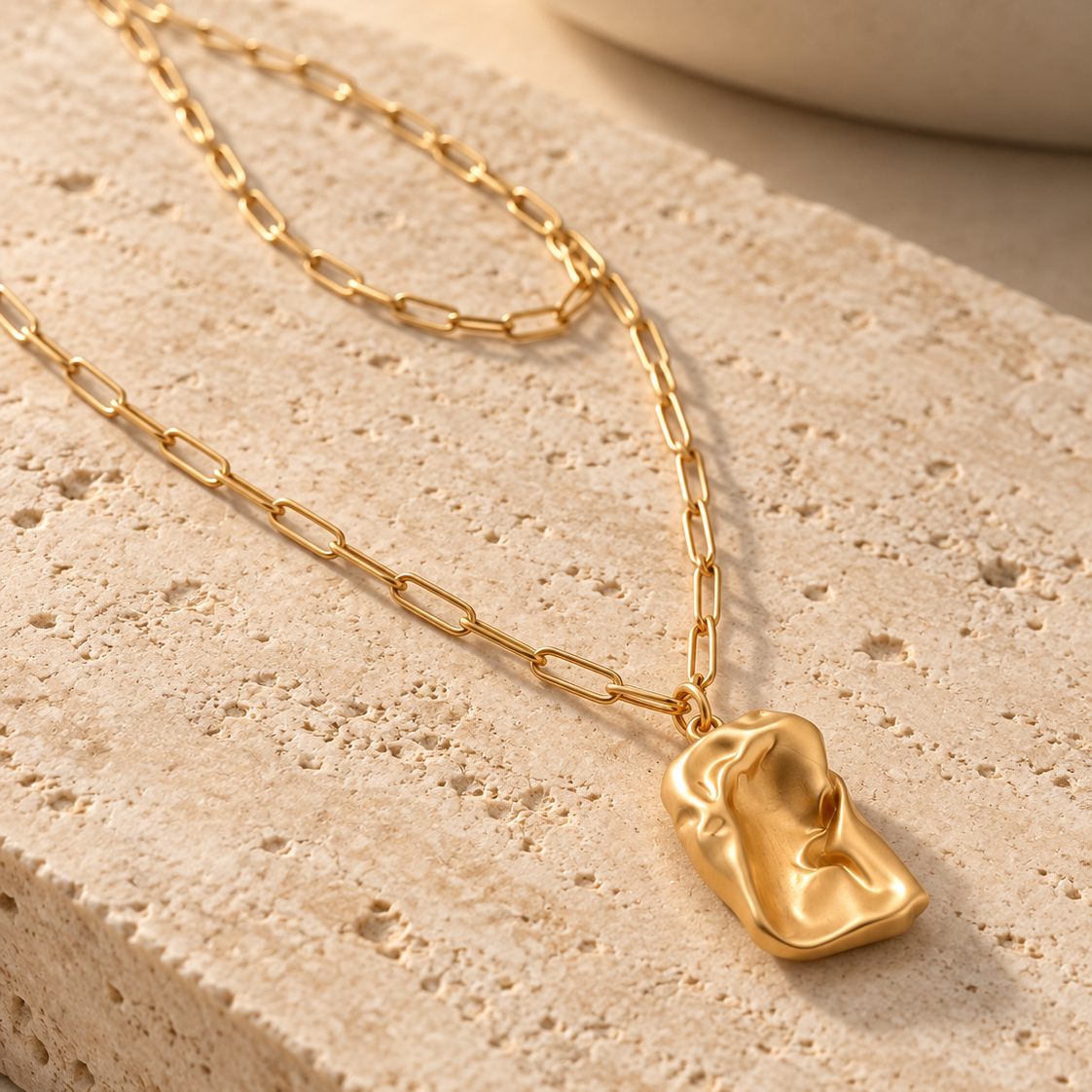 Molten Dreams gold-tone layered necklace on a white background